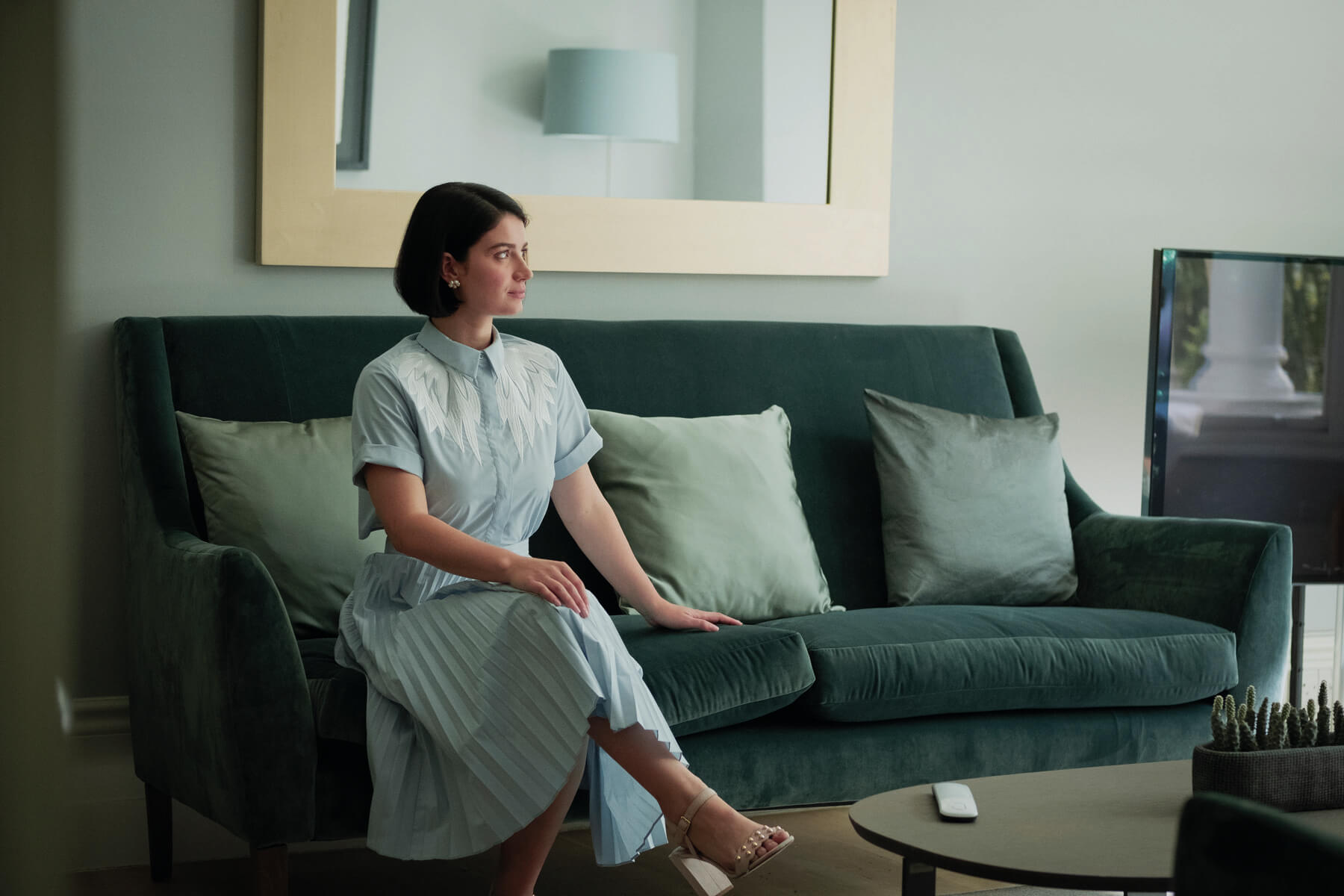 Eve Hewson as Adele on the pristine living room set of Behind Her Eyes