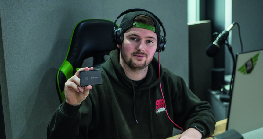 Man holding Samsung Portable SSD T7 Touch