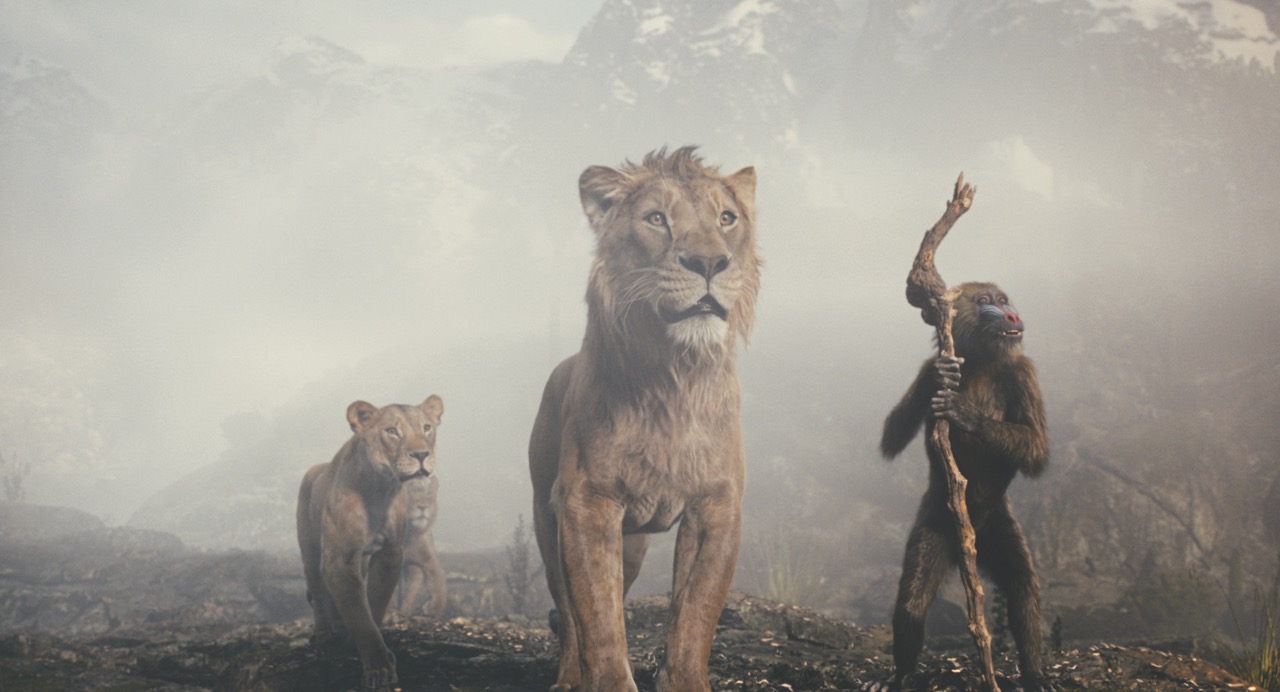 Two lions and a monkey with a walking stick standing in front of a foggy background