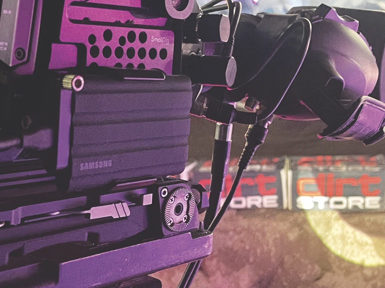 A close up of a camera with purple lighting