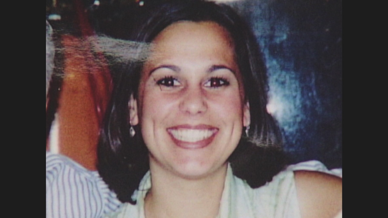 An old photo of a woman smiling
