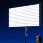 A panel light from Nanlite in a dark blue studio