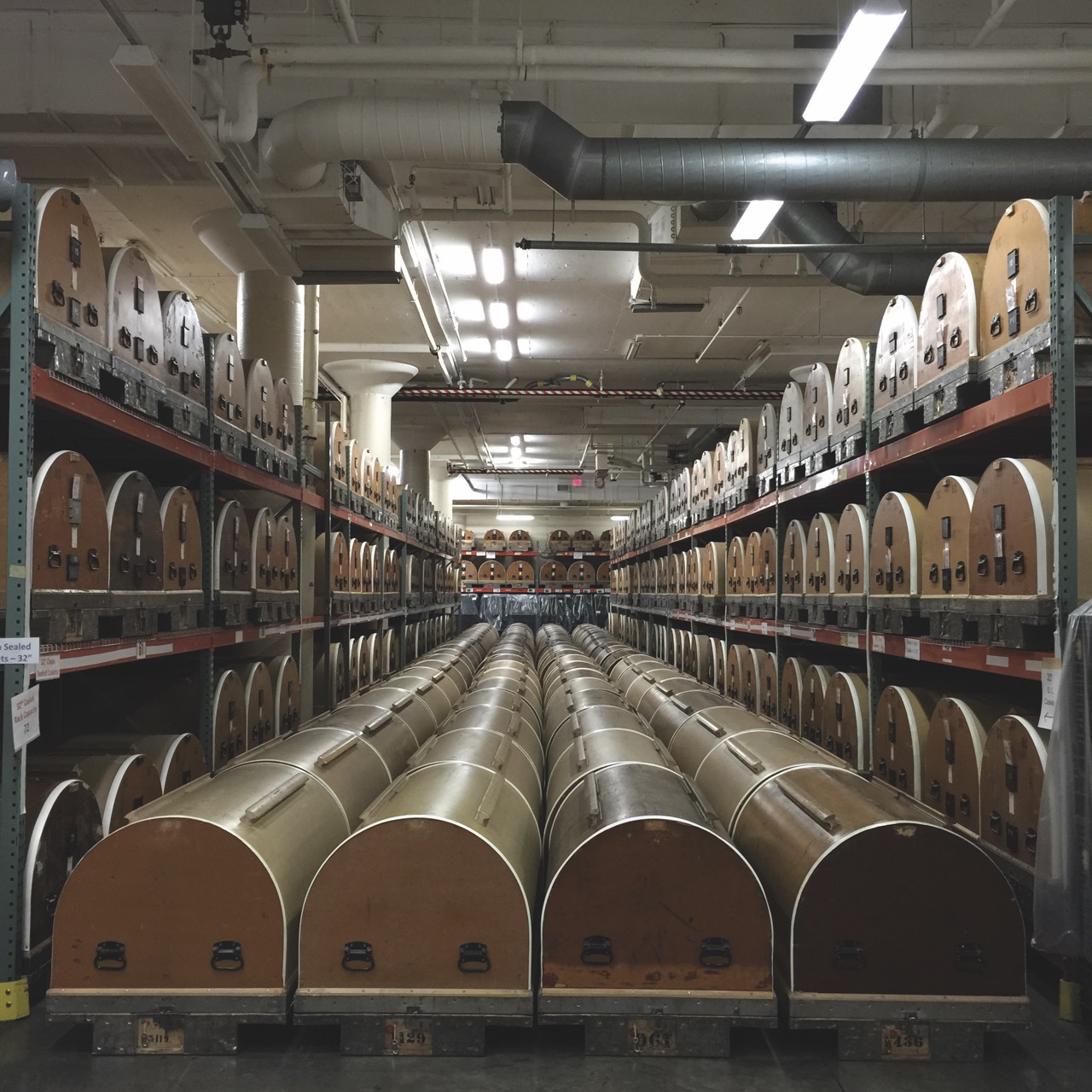 Cases of film filling a storeroom