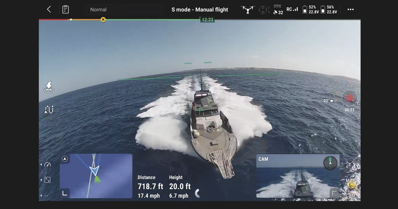 A still from editing software showing an aerial view of a large boat in the ocean