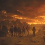 A sci-fi landscape with a line of people staring into the distance at jagged mountains and an orange landscape